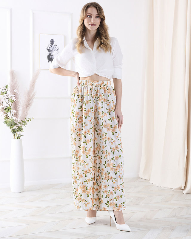 Dámské bílé látkové kalhoty s květinami - Oblečení