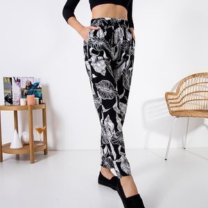 Černé dámské kalhoty s květinovým vzorem - Oblečení