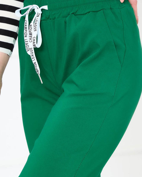 Dámské látkové kalhoty v zelené barvě- Oblečení