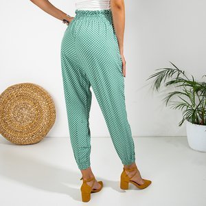 Dámské zelené puntíkové kalhoty PLUS SIZE - Oblečení