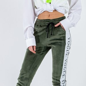 Dámské zelené zateplené tepláky s bílými pruhy - Oblečení