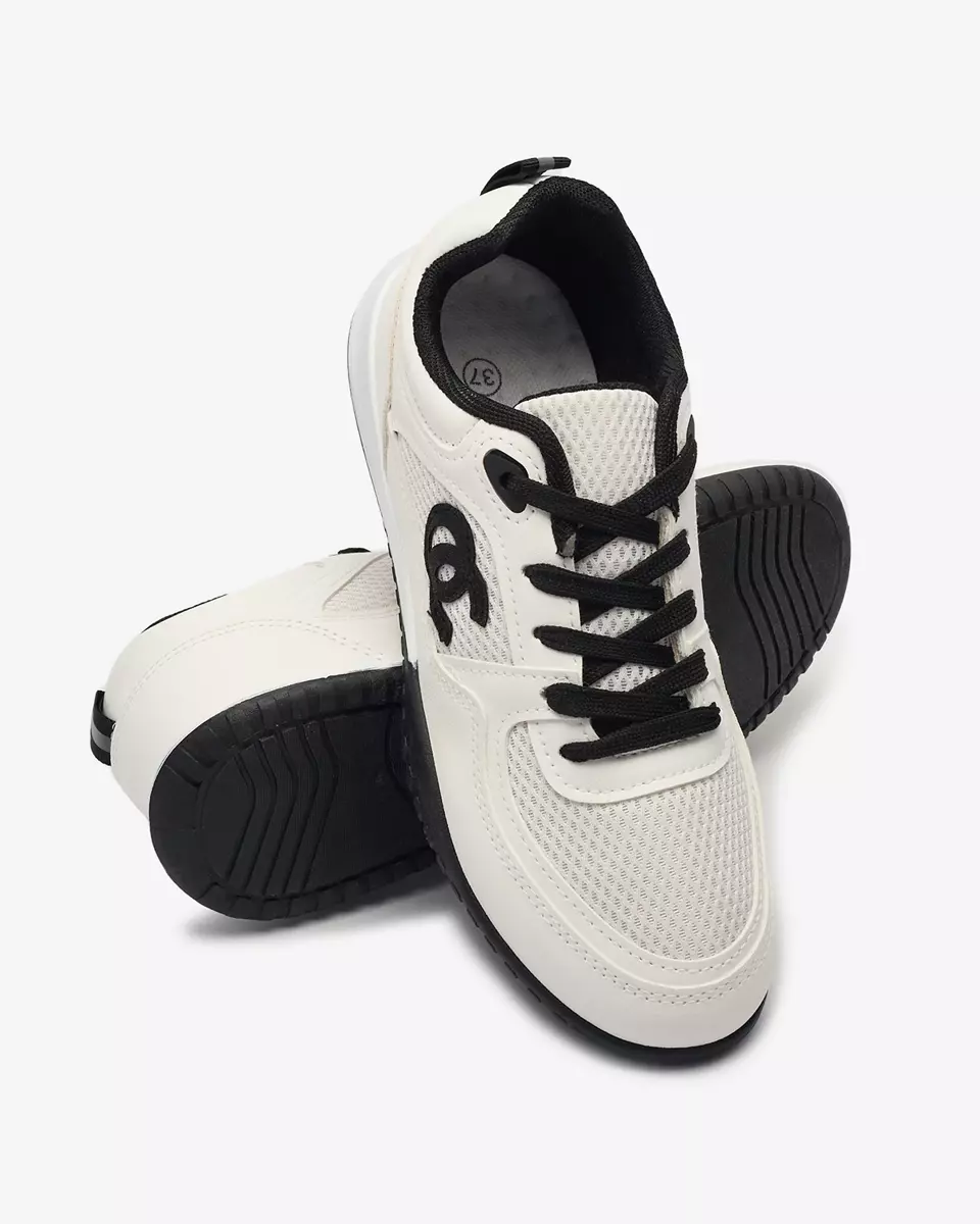 OUTLET Royalfashion Bílo-černá dámská sportovní obuv Bofiale