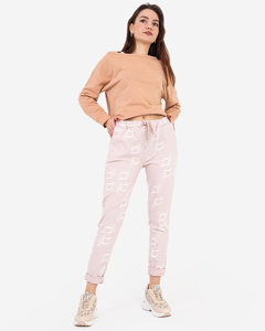 Světle růžové dámské látkové kalhoty s nápisy - Oblečení