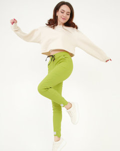 Světle zelené dámské látkové kalhoty se záplatami - Oblečení