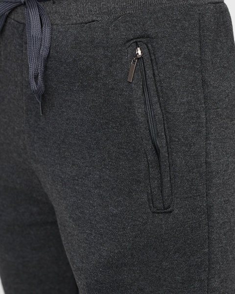 Tmavě šedé dámské tepláky se zateplením - Oblečení