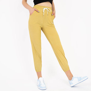 Žluté dámské látkové kalhoty s nášivkou - Oblečení