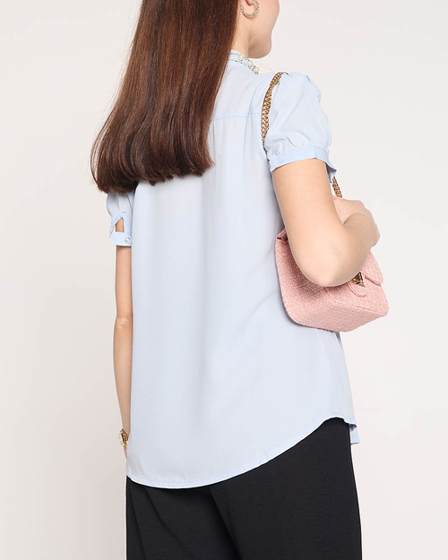 Жіноча блакитна сорочка застібається на гудзики - Одяг