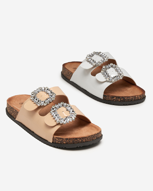 Білі жіночі шльопанці з декорованими застібками Olimika