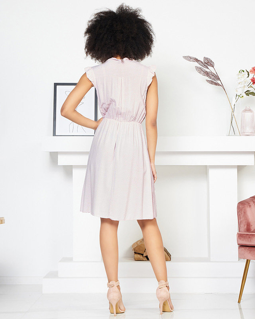 Світло-рожеве жіноче плаття в горошок із зав'язаним вирізом - Одяг
