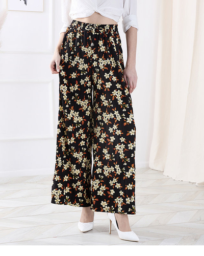 Жіночі чорні штани з квіткової тканини - Одяг