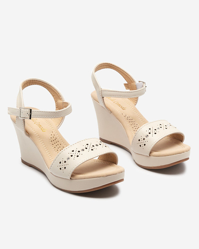 OUTLET Béžové dámské sandály na klínku Bellomia - Obuv