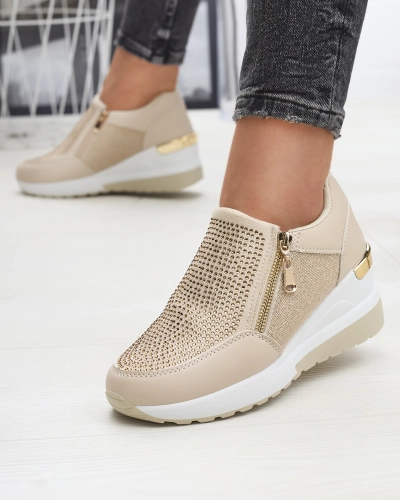 Бежеві жіночі спортивні туфлі на платформі з цирконами Martela - Взуття