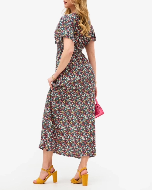 Жіноча сукня міді зеленого кольору з квітковим вирізом - Одяг