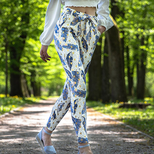 Білі жіночі штани з принтом