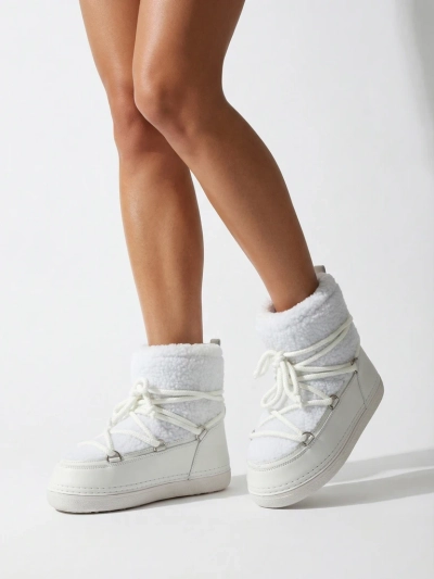 Dámské sněhule s kožíškem Uvella