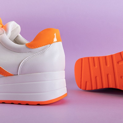 Біло-помаранчеві кросівки на платформі Dahna