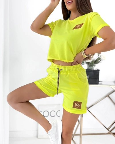 Royalfashion Neonově žlutá dvoudílná dámská sportovní souprava s nášivkami