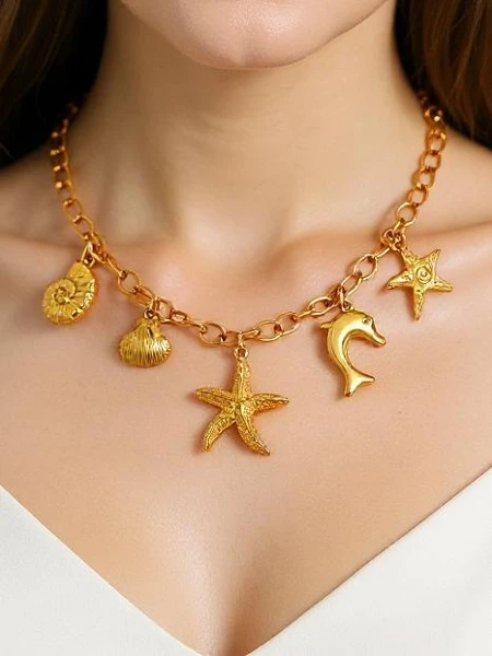 Náhrdelník Atena Charm Sea – zlaté amulety s mořskými motivy