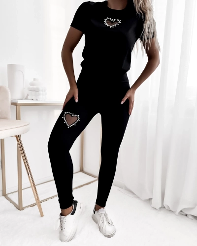 Royalfashion Černá dámská sportovní souprava se srdíčky