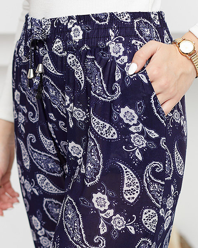 Темно-сині та білі жіночі штани з принтом - Одяг