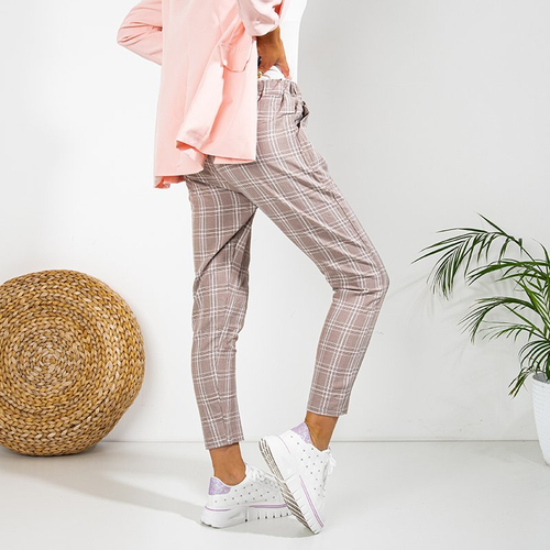 Коричневі жіночі штани в клітинку