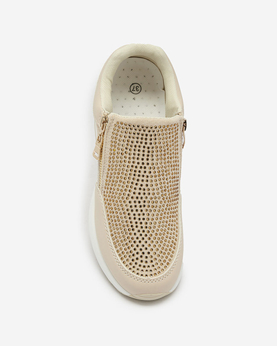 Бежеві жіночі спортивні туфлі на платформі з цирконами Martela - Взуття