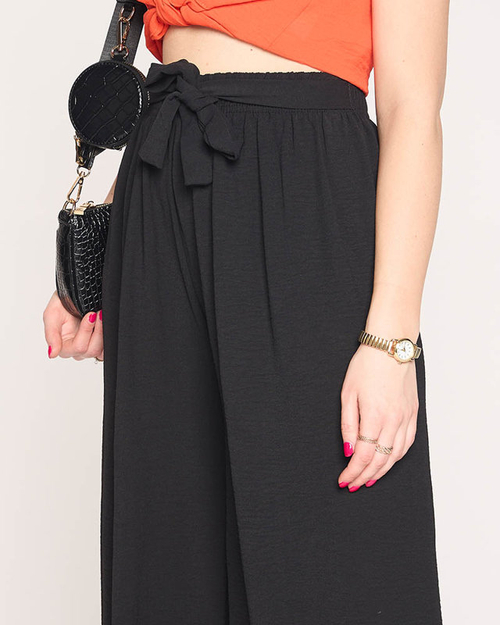 Жіночі широкі штани палаццо чорного кольору - Одяг