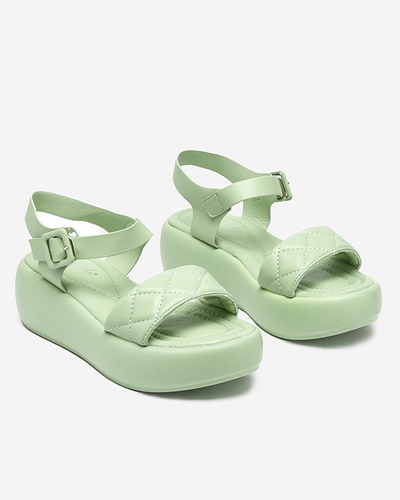 Жіночі стьобані босоніжки з екошкіри на танкетці зеленого кольору Baloui. Взуття