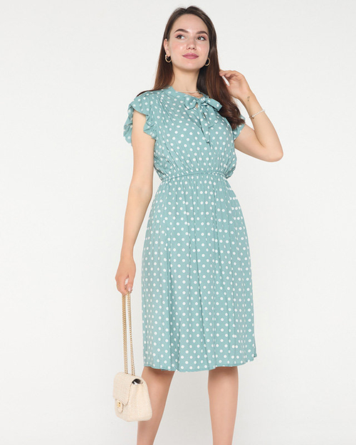 Жіноча сукня м'ятного кольору в горошок