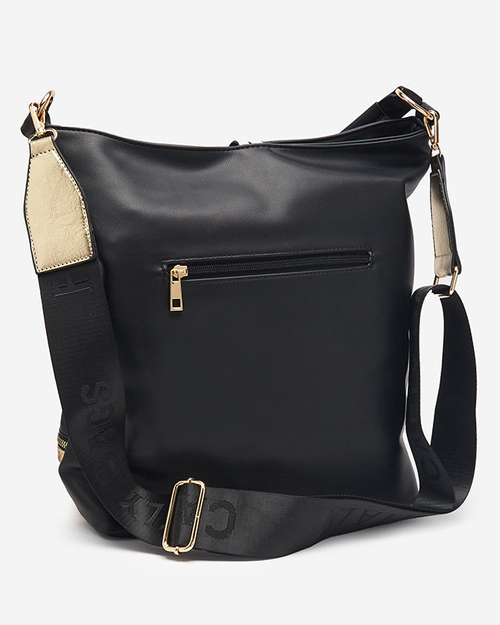 Чорно-золота жіноча сумочка з декоративними смужками - Аксесуари