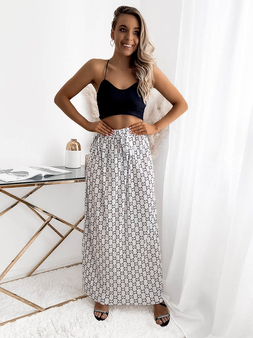 Біла жіноча плісирована спідниця максі з візерунками - Одяг