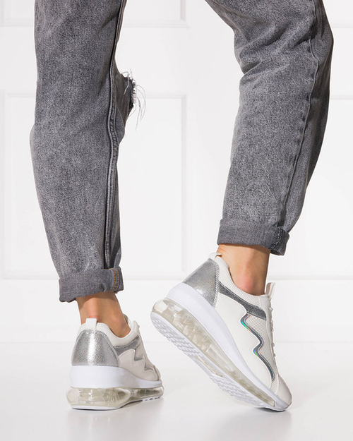 OUTLET Кремове жіноче спортивне взуття на танкетці Runiso - Взуття