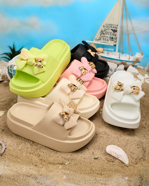 Royalfashion Жіночі гумові шльопанці з декоративним бантом Nilm