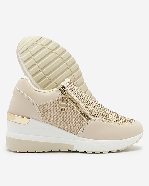 Бежеві жіночі спортивні туфлі на платформі з цирконами Martela - Взуття