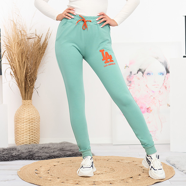 Жіночі зелені спортивні штани з кольоровою нашивкою - Одяг