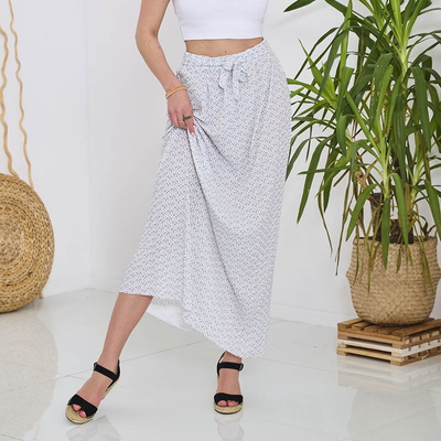 Біла жіноча плісирована спідниця міді з візерунком - Одяг