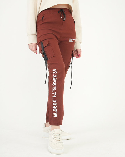 Коричневі штани з написами