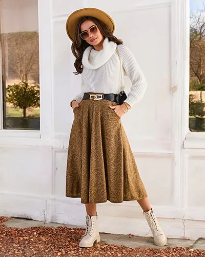 Dámská midi sukně Royalfashion Dámská midi sukně vyrobená z měkké látky. Model má pásek. Dokonalý základ pro mnoho jedinečných outfitů! POZNÁMKA: Přesnost měření (+/-)