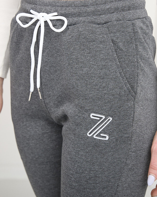 Šedé dámské zateplené tepláky- Oblečení