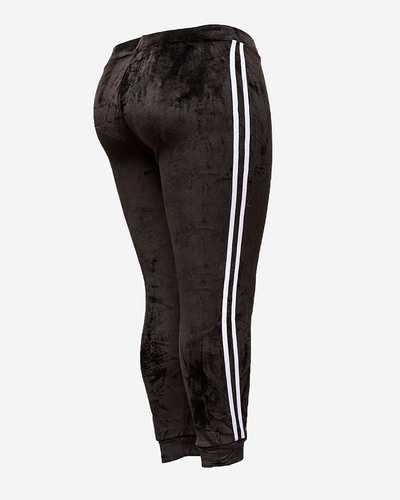 Royalfashion Dámské zateplené tepláky s lemováním