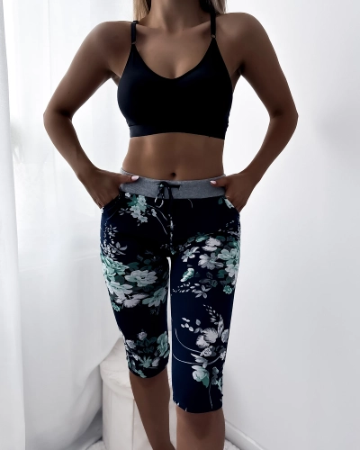 Жіночі шорти 3/4 з малюнком темно-синьо-зеленого кольору. PLUS SIZE - Одяг