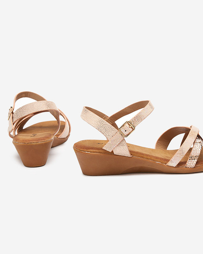 Світло-рожеві жіночі сандалі на танкетці Saline - Взуття