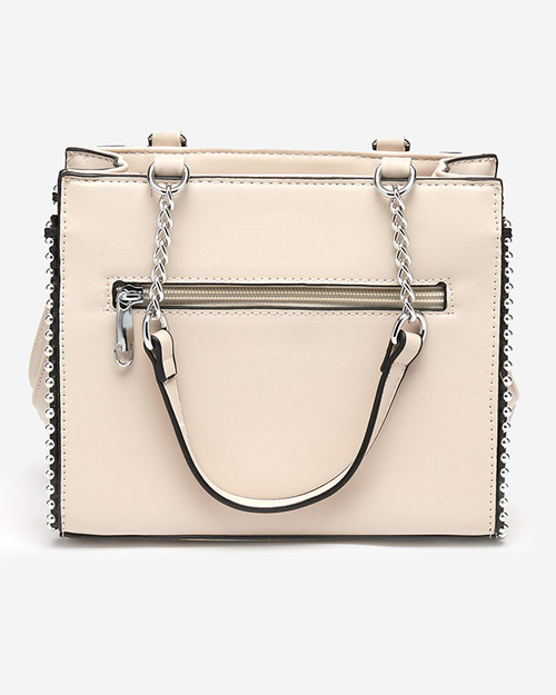 Бежева жіноча сумочка з плетеною вставкою