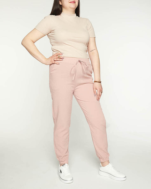 Жіночі джоггери з рожевої тканини PLUS SIZE - Одяг