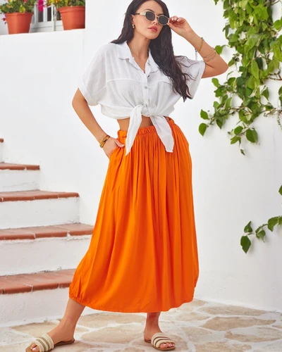 Royalfashion Жіноча віскозна міді-спідниця Літня легка з двома кишенями