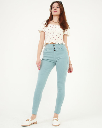 Жіночі штани м'ятно-зеленого кольору з декоративними ґудзиками