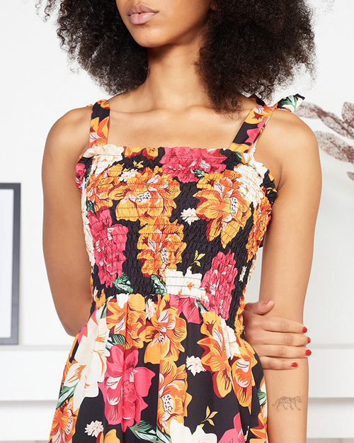 Помаранчево-рожева коротка сукня з візерунком