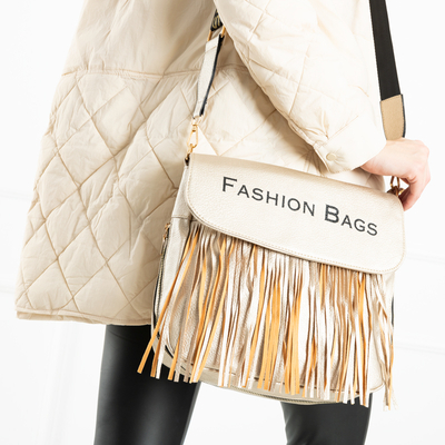 Золота сумка з написом та бахромою