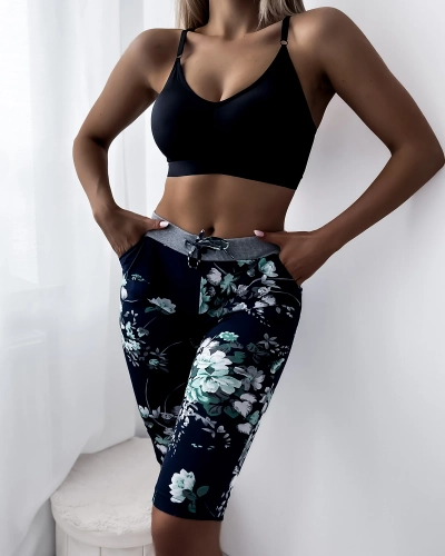 Dámské 3/4 tmavě modré kraťasy se zelenými květy PLUS SIZE - Oblečení