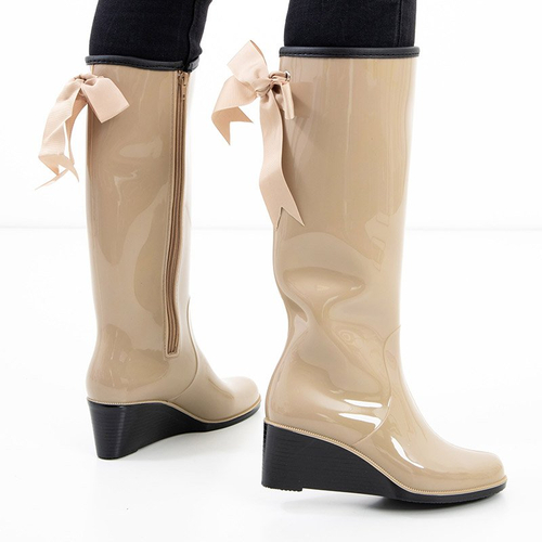 Бежеві жіночі гумові чоботи на танкетці Genofa - Взуття